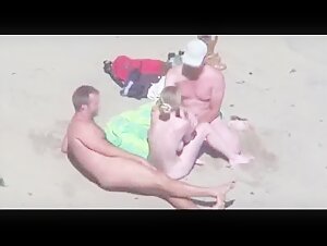 Beautiful bitch gropedby his husband and stranger at beach